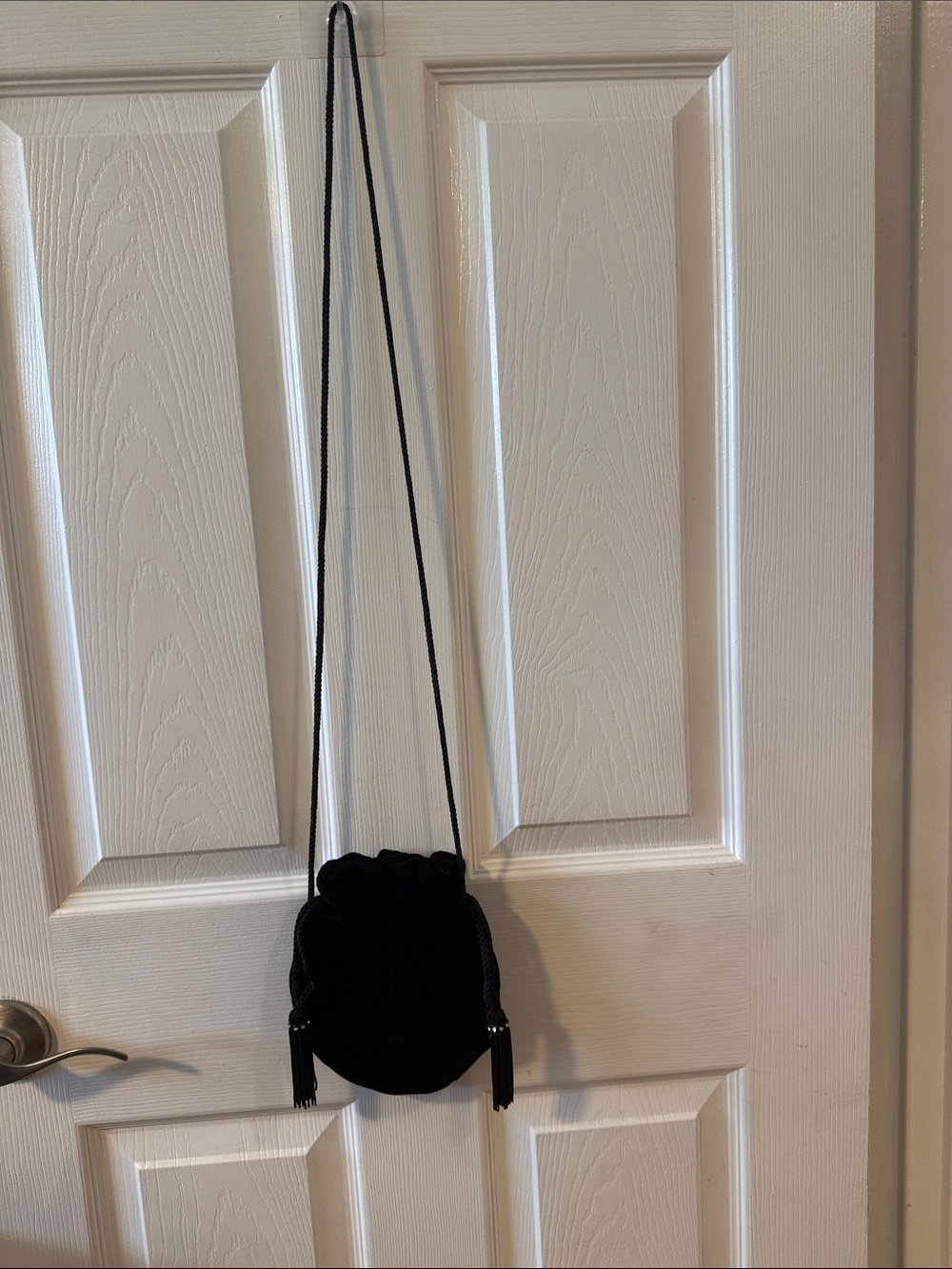 Pacific Connections Black Mini Drawstring Crossbody Bag with Tassels